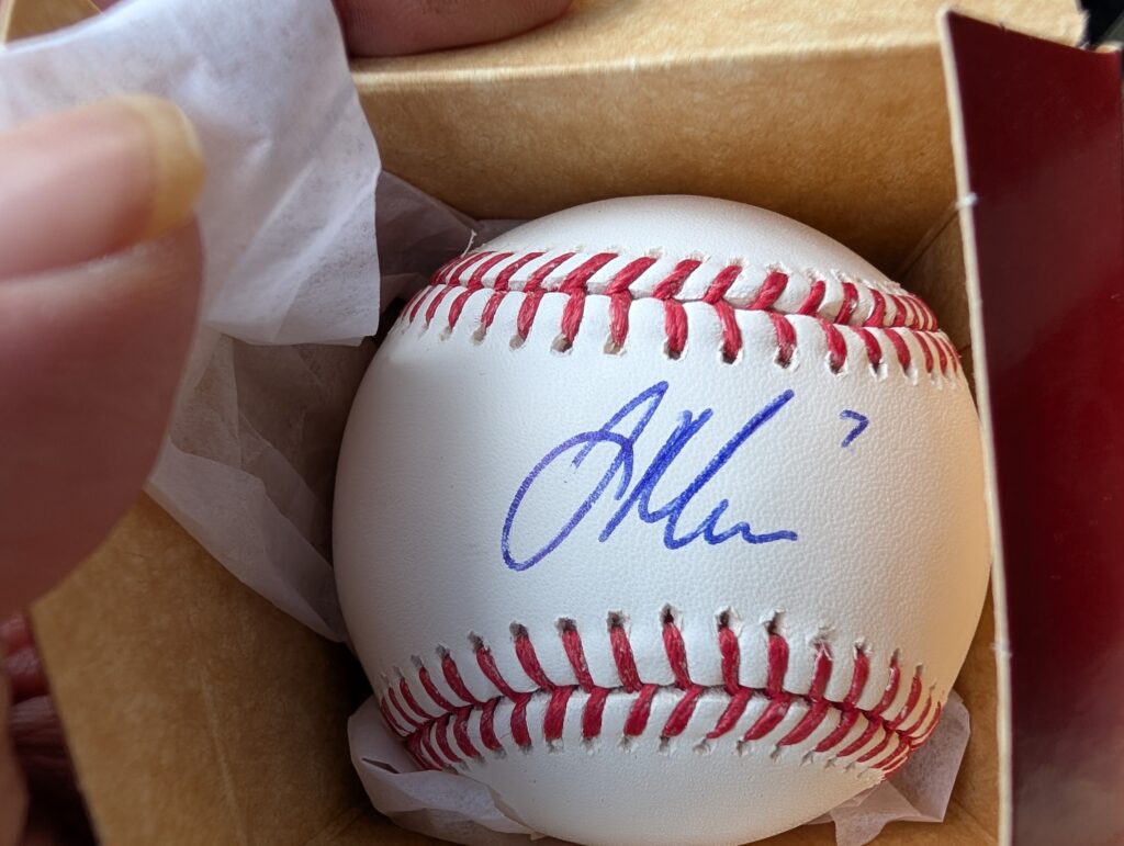 Autographed baseball in cardboard display box
